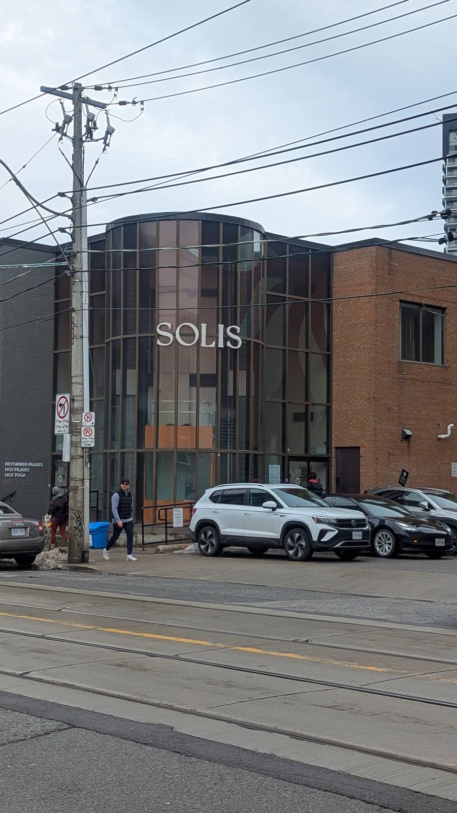 Solis Movement – reformer studio with warm lighting and the Solis sign
